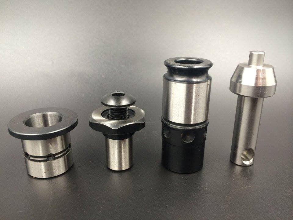 Turned cylindrical components with flanges, grooves and hexagonal features